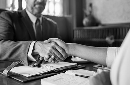 Business partners shaking hands.